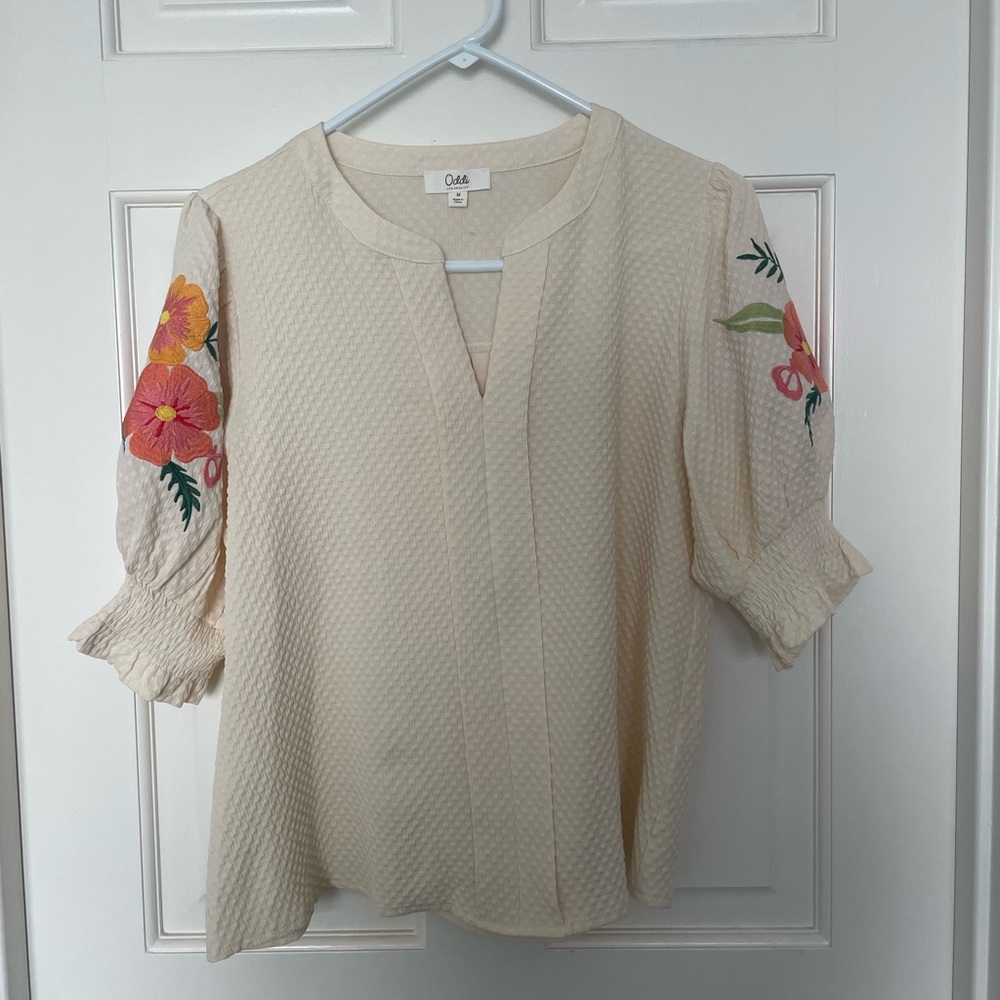Women’s size medium Oddi short sleeve blouse with embroidered floral sleeves